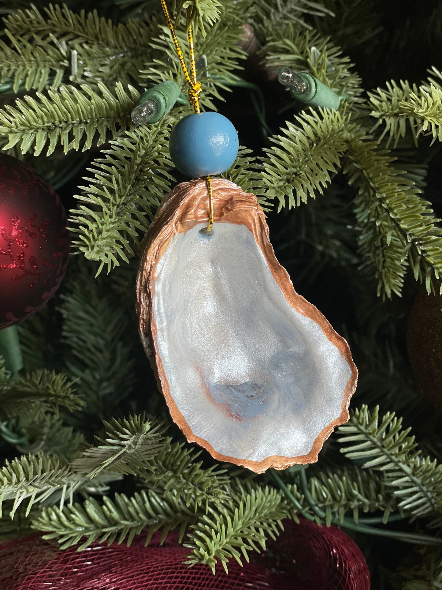 Hand painted icy blue oyster shell ornament