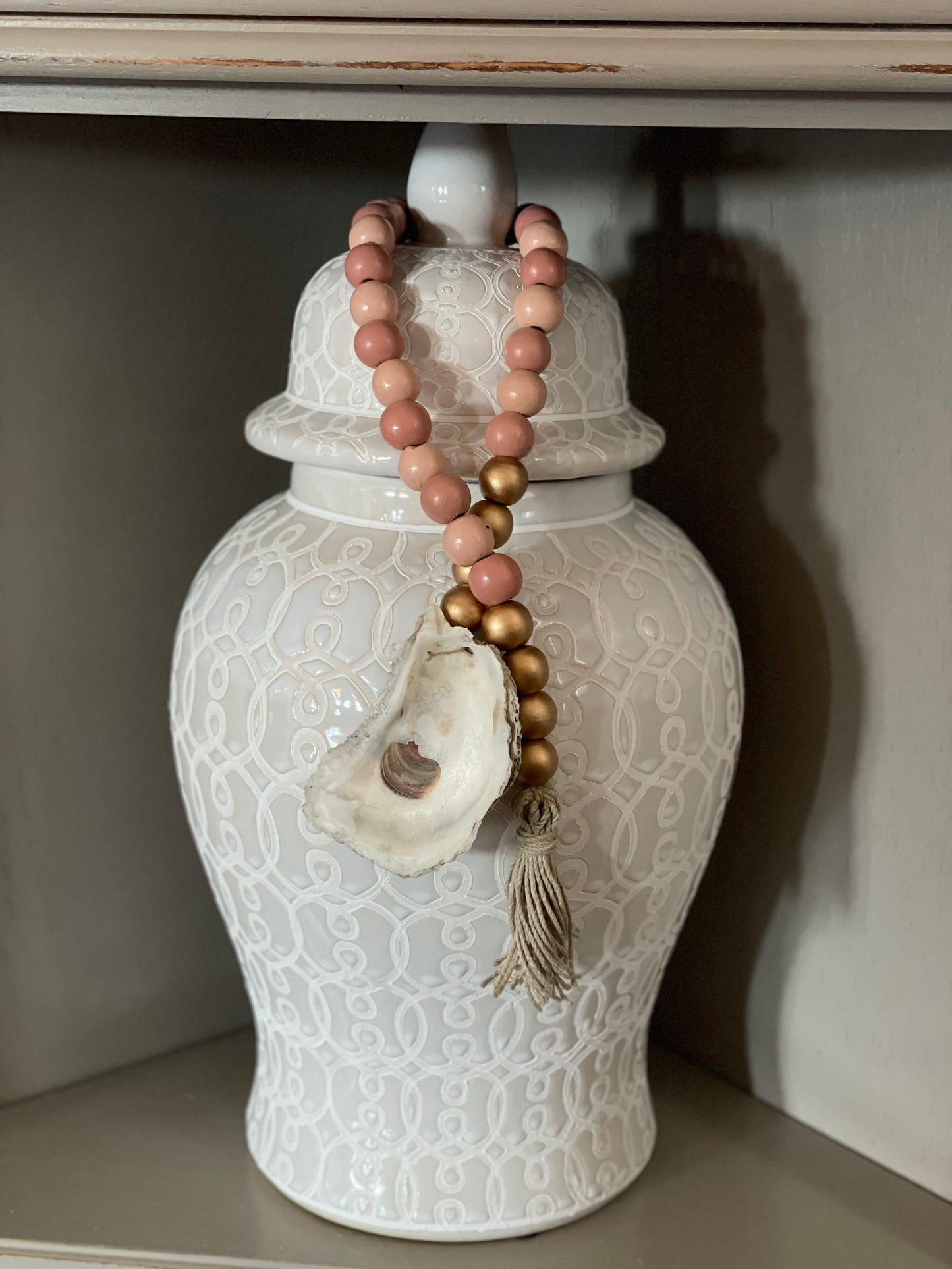 Oyster prayer beads with twine tassel