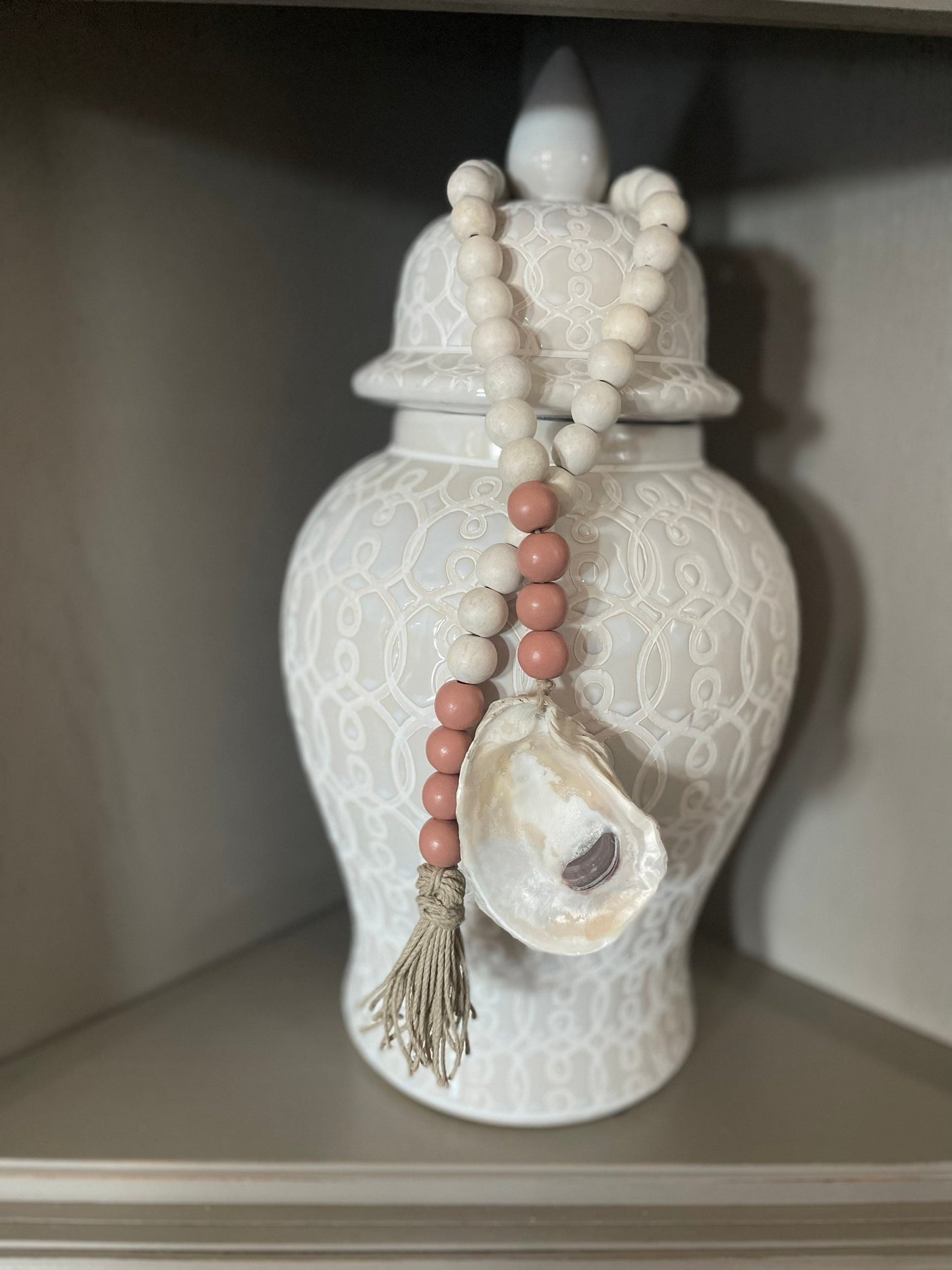 Oyster prayer beads with twine tassel