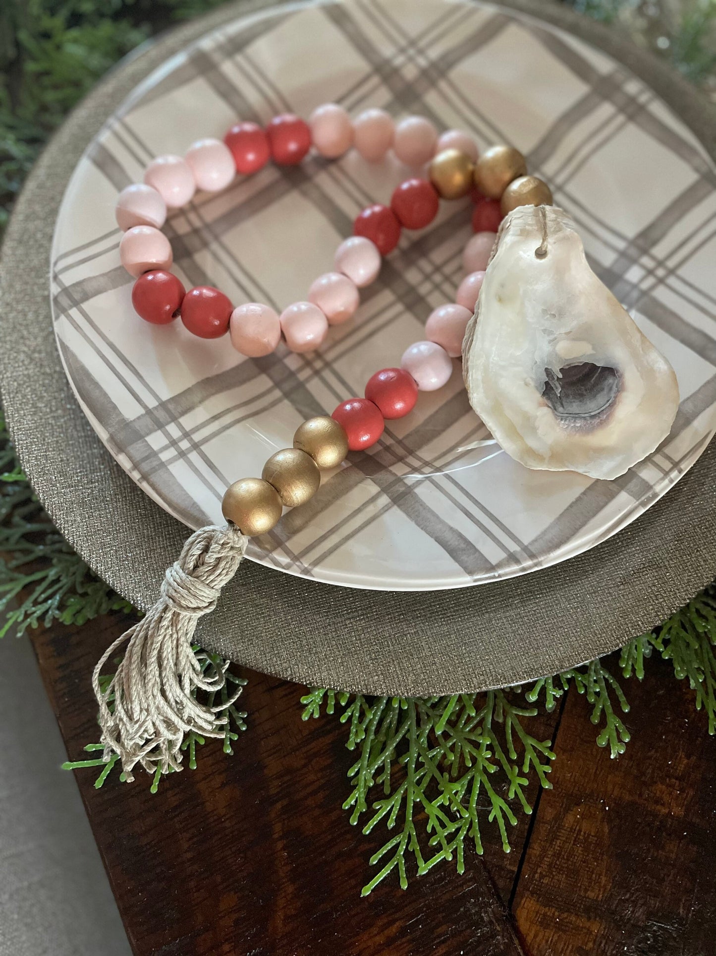 Oyster prayer beads with twine tassel