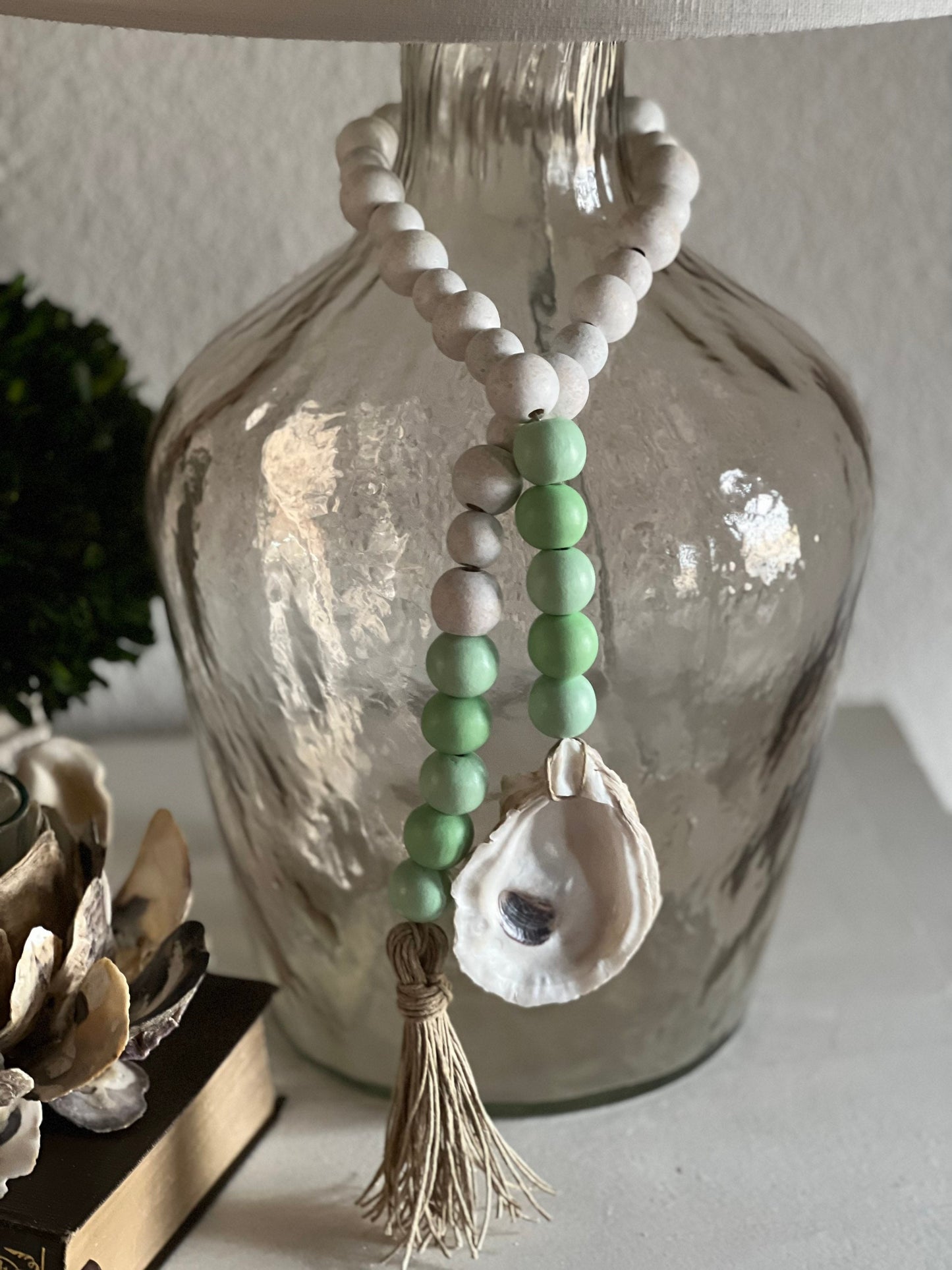Oyster prayer beads with twine tassel