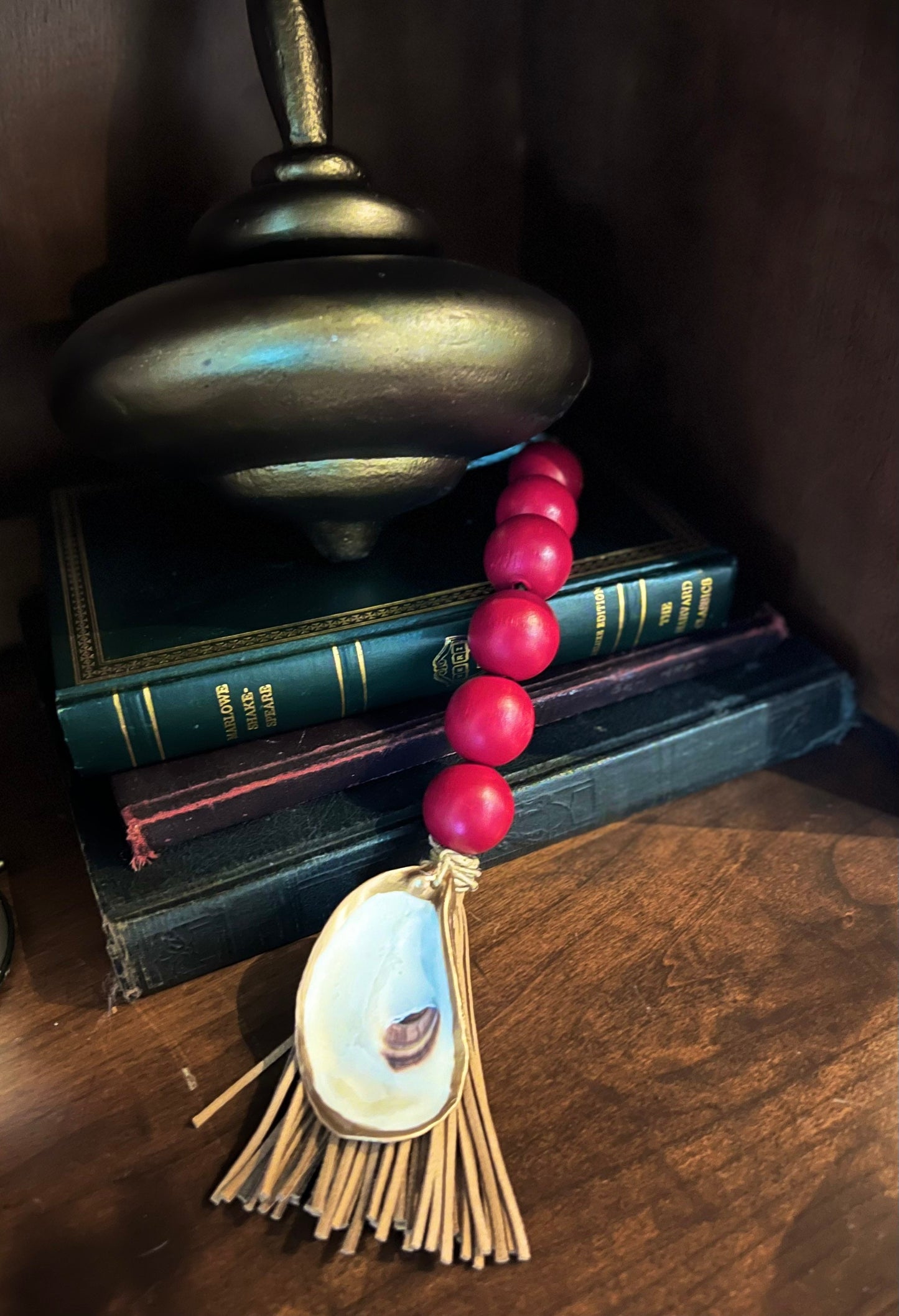 Gilded oyster Beaded decor with faux leather tassel