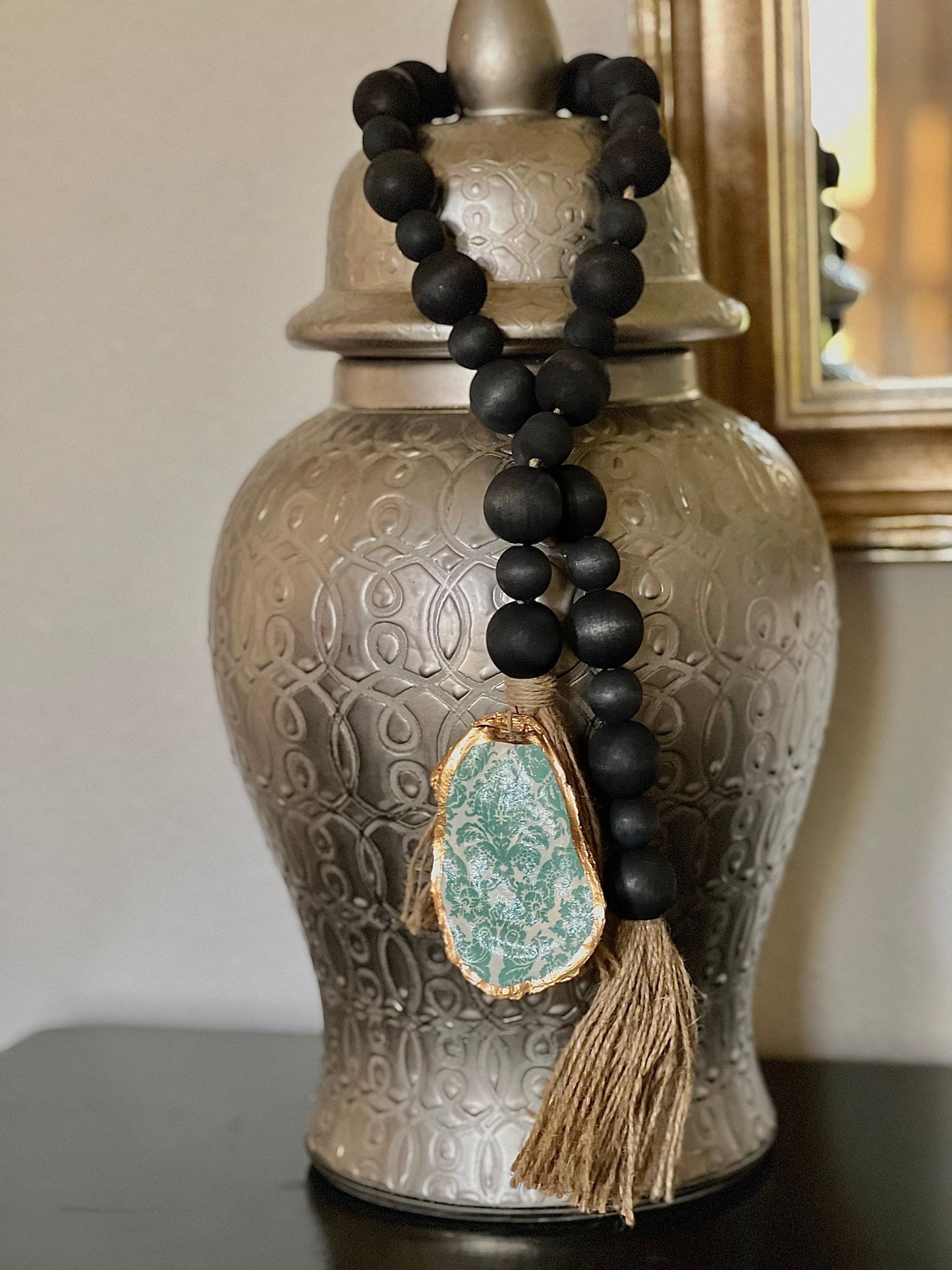 Decoupaged Oyster prayer beads with twine tassels