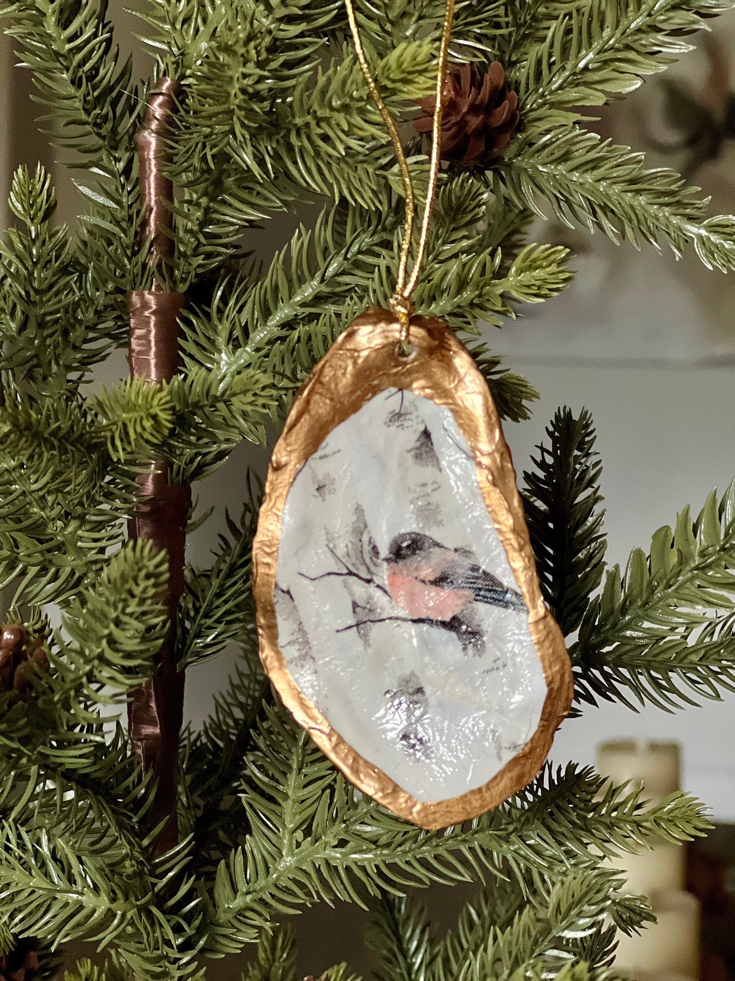 Decoupage oyster shell ornament