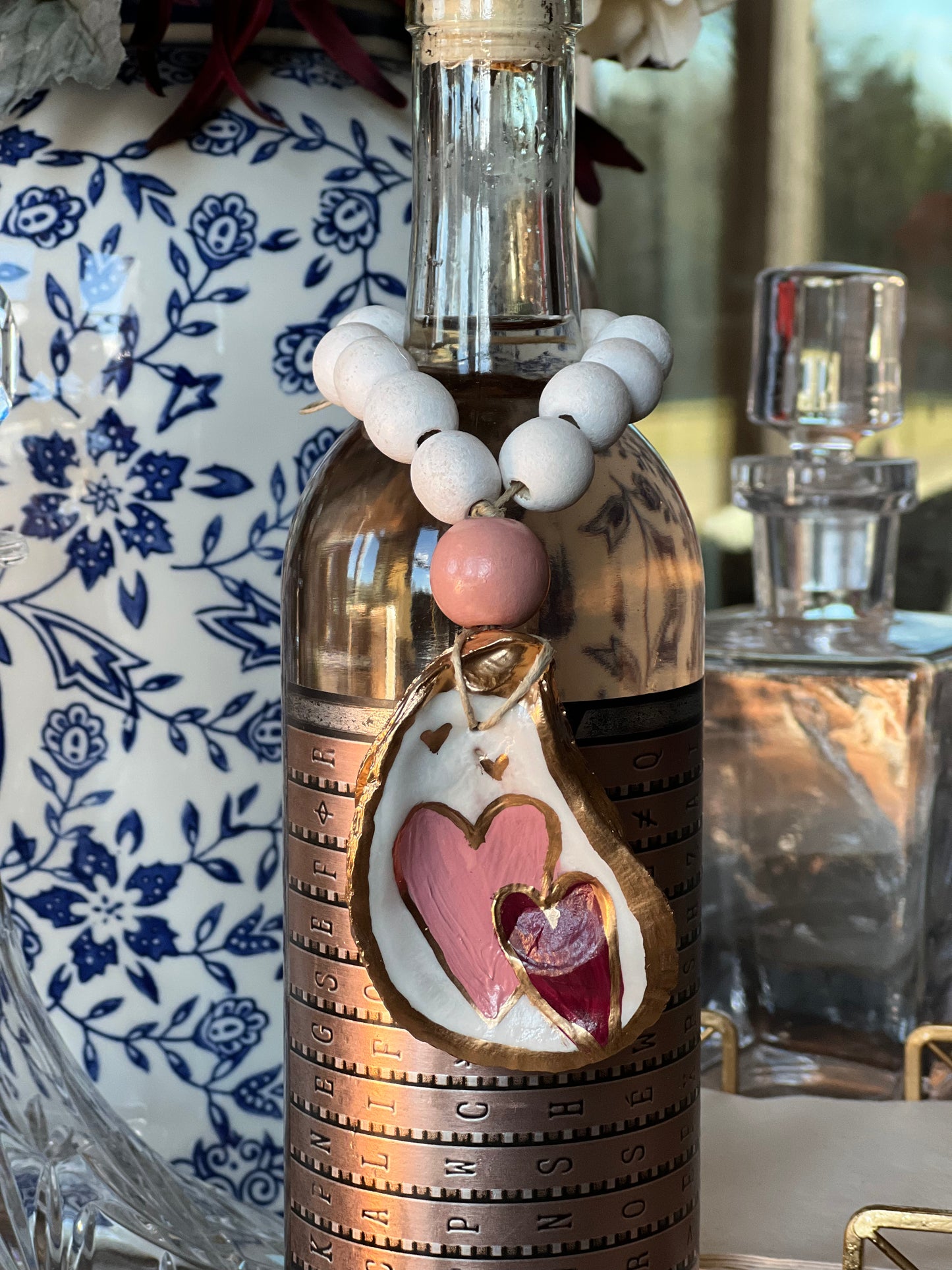 Hand-painted heart oyster shell bottle charm