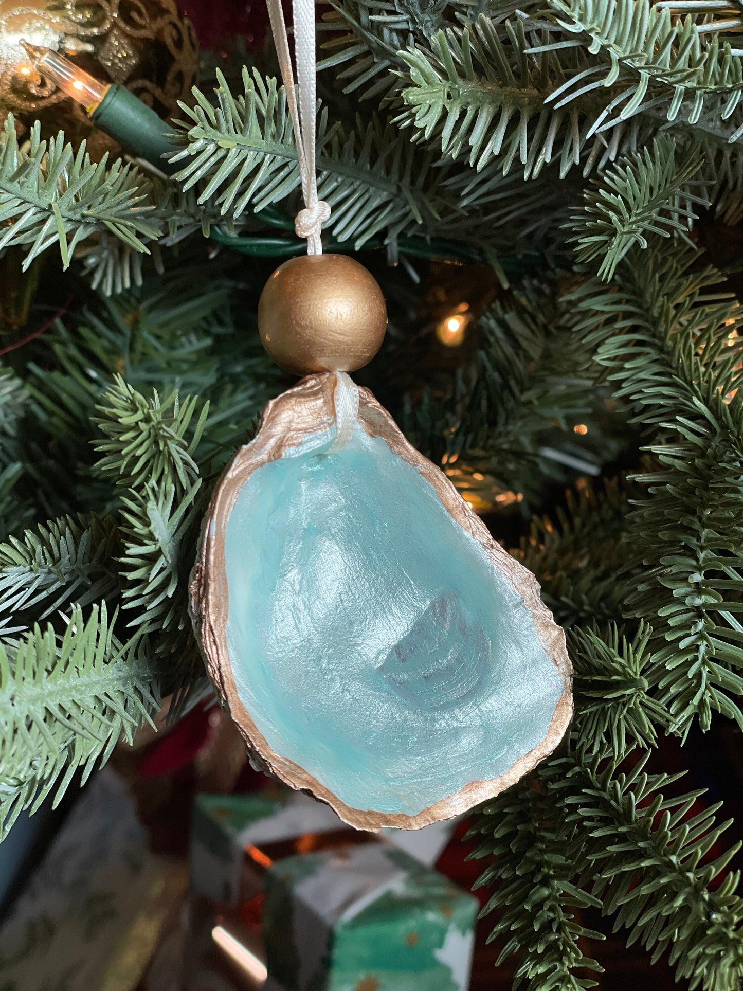 Light blue metallic oyster ornament