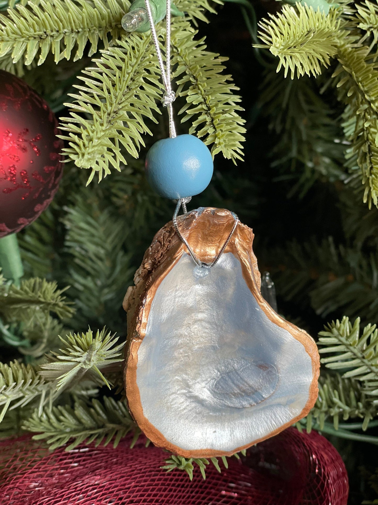 Icy blue metallic oyster ornament