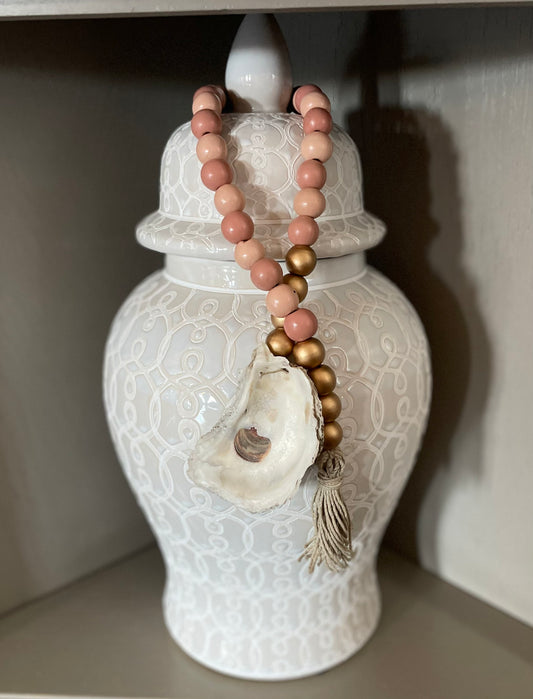 Oyster prayer beads with twine tassel