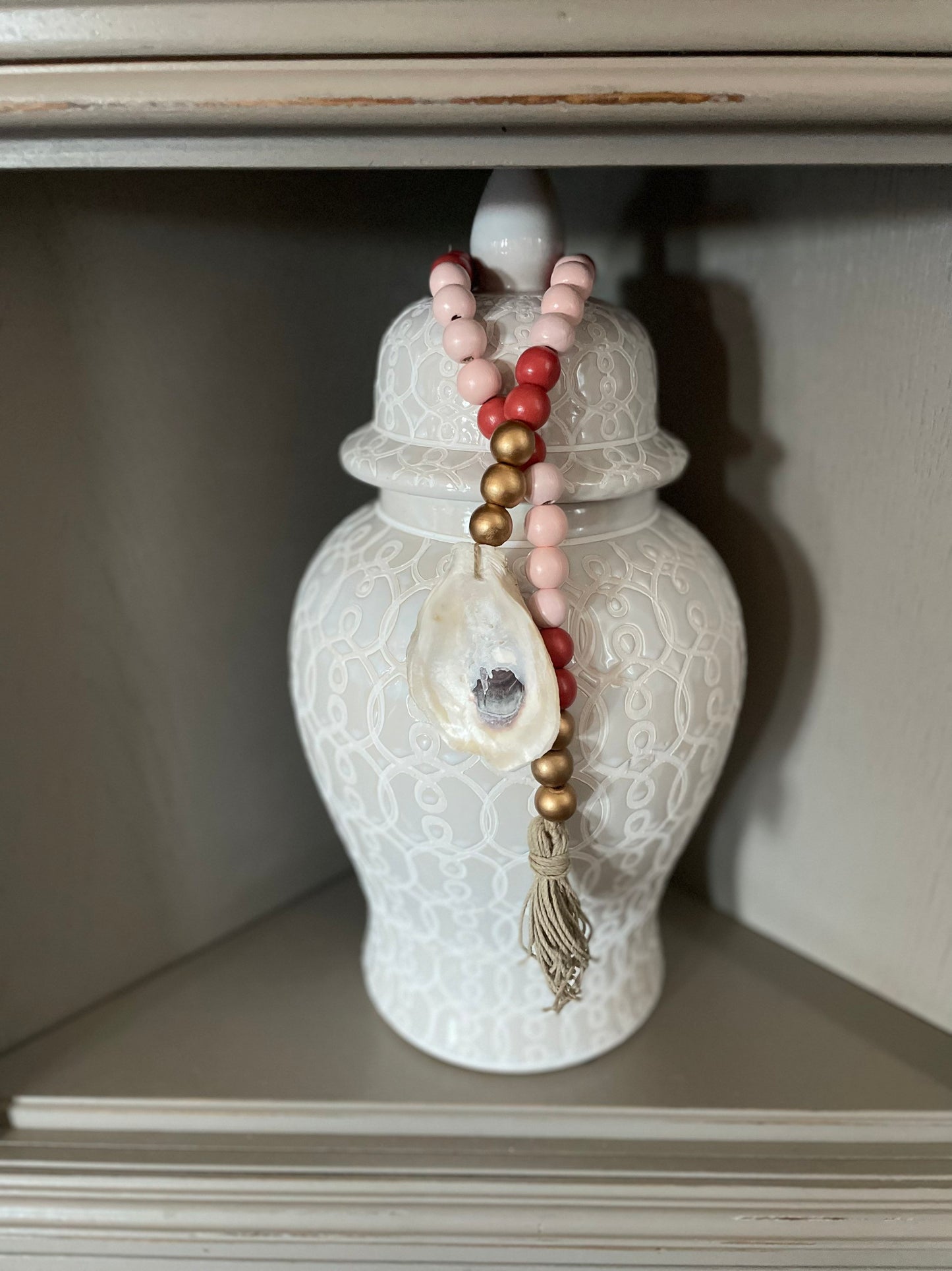 Oyster prayer beads with twine tassel