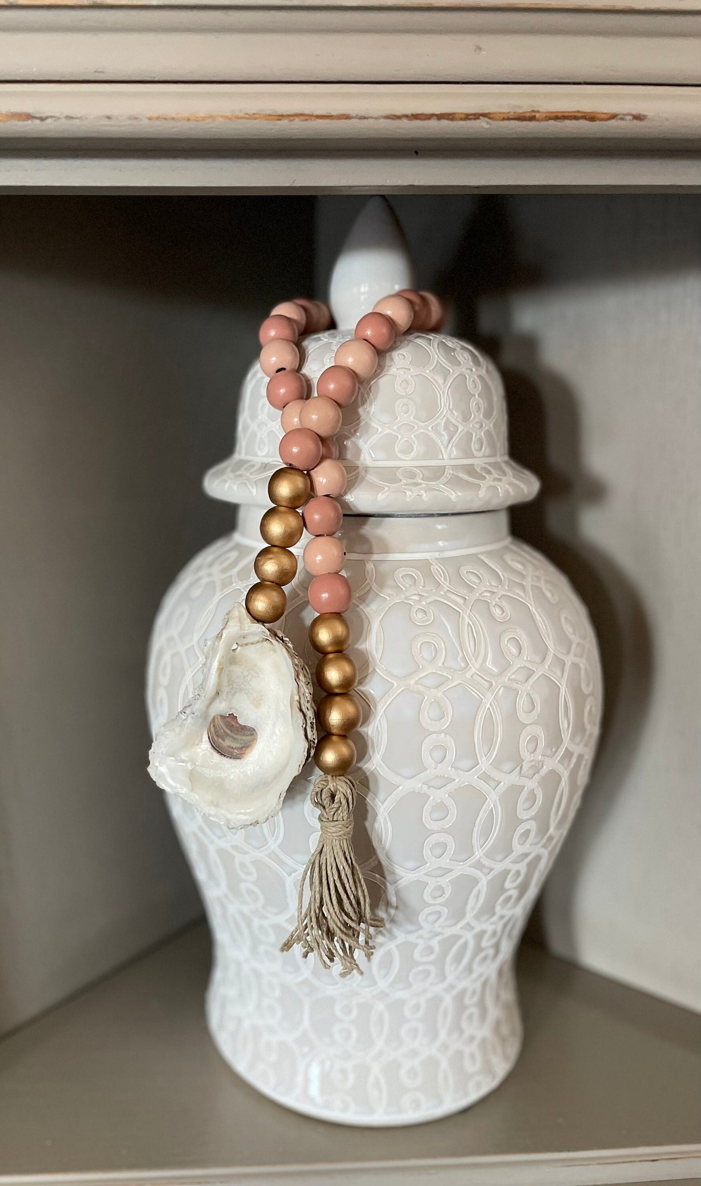 Oyster prayer beads with twine tassel