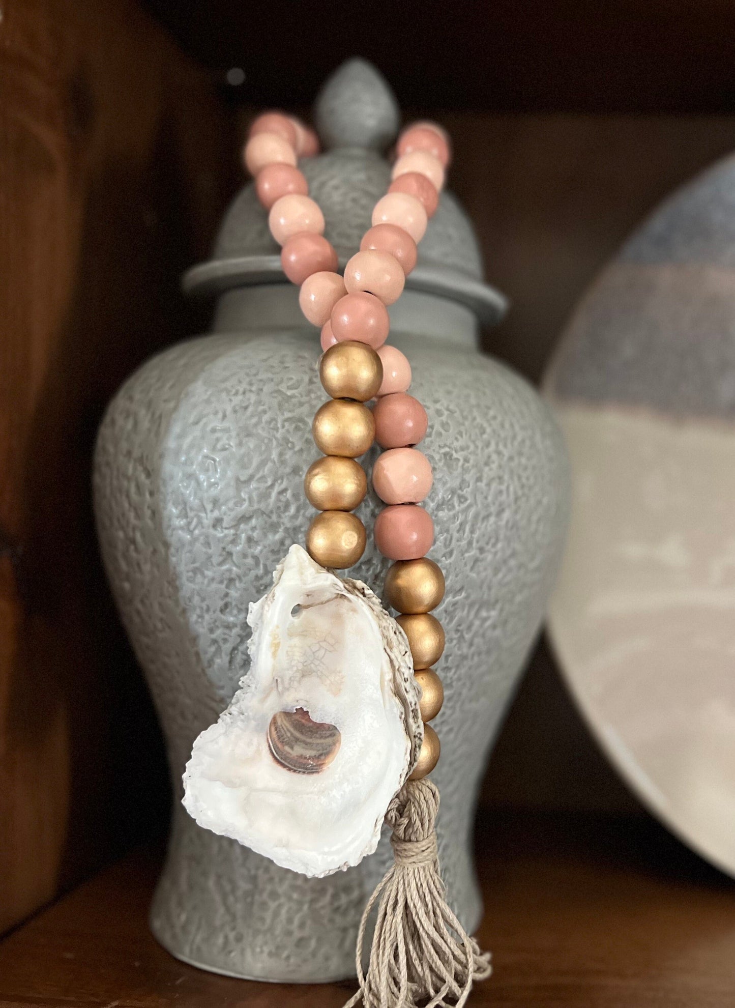 Oyster prayer beads with twine tassel