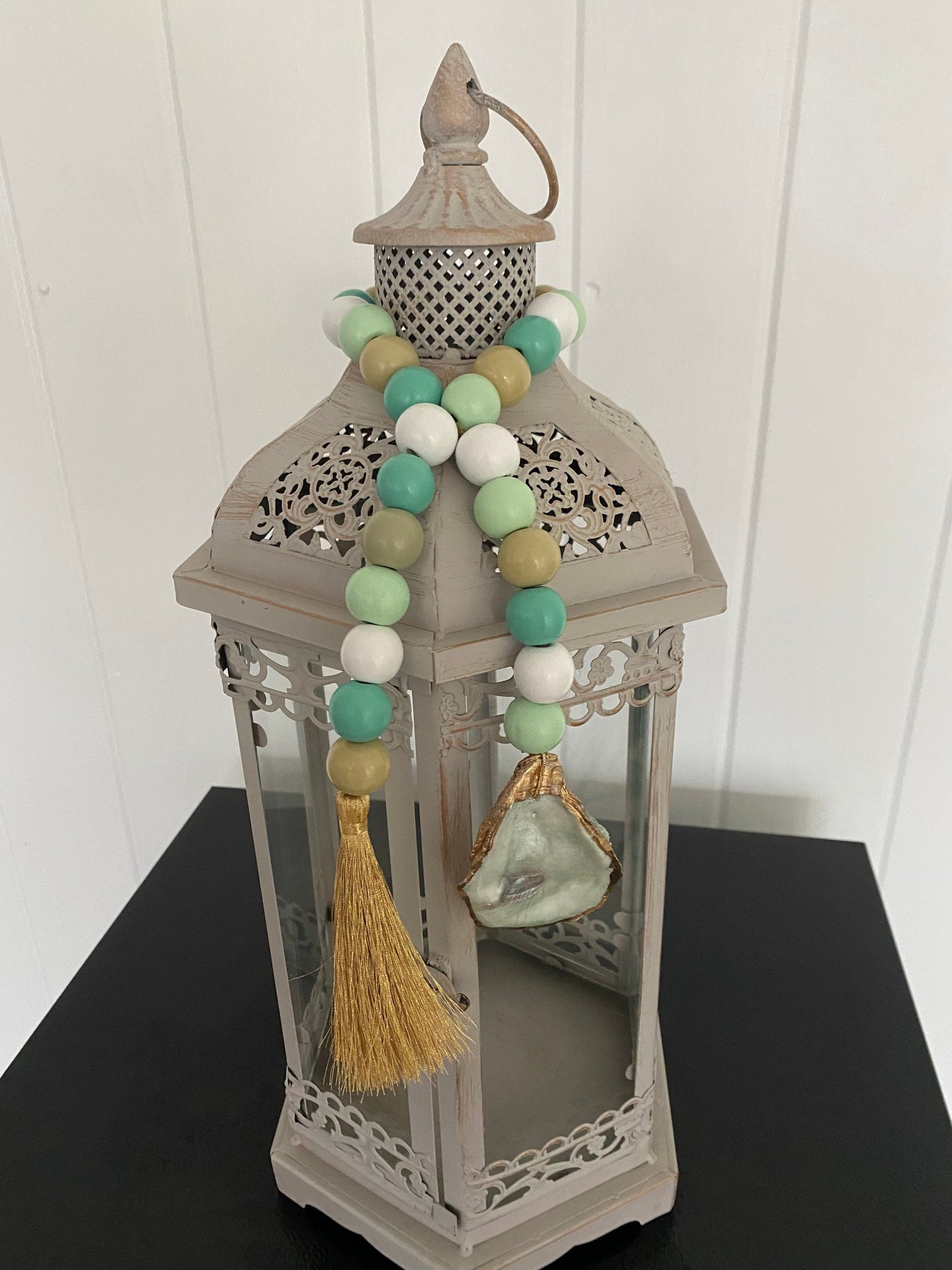 Oyster prayer beads with gold tassel