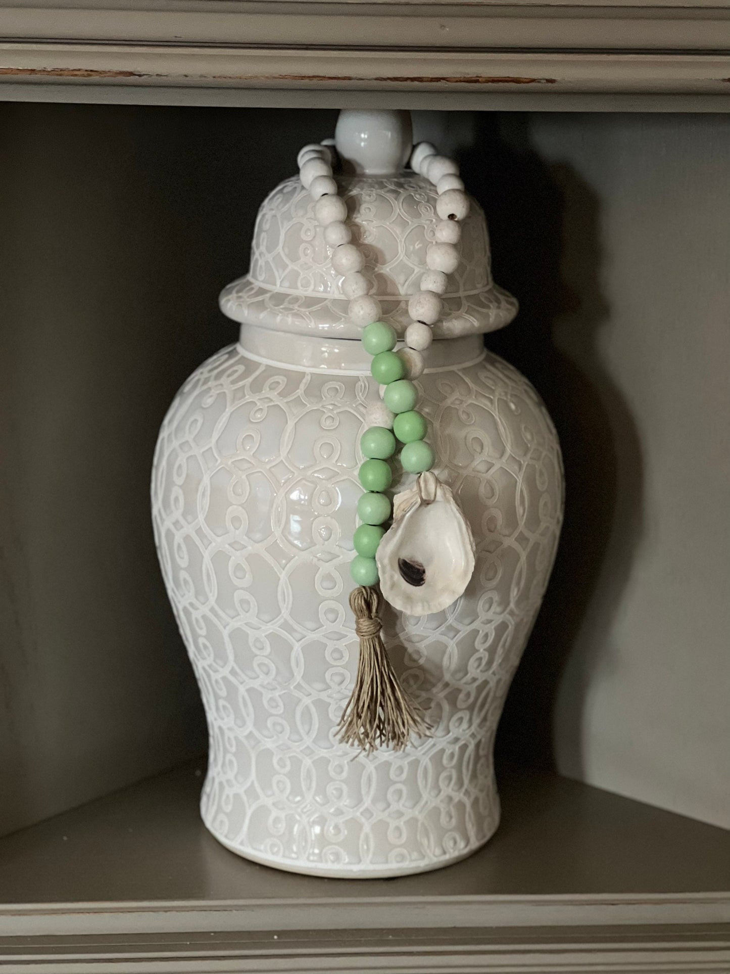 Oyster prayer beads with twine tassel