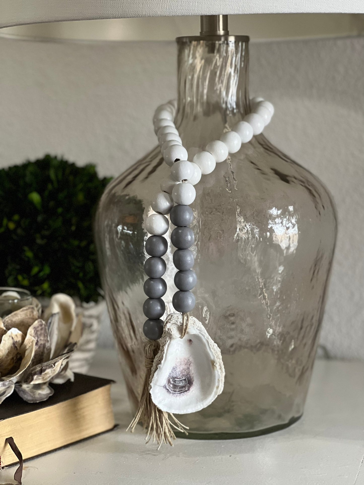 Oyster prayer beads with twine tassel