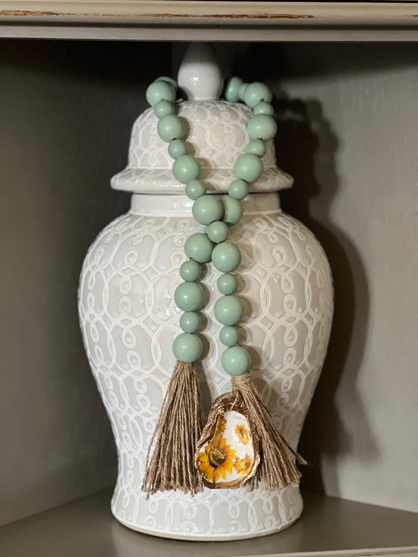 Decoupaged Oyster prayer beads with twine tassels