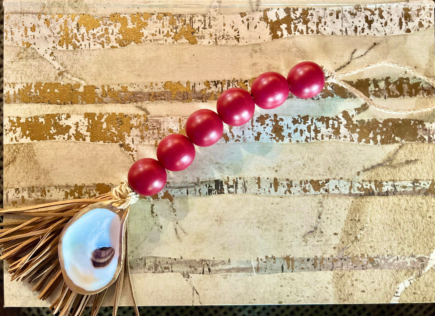 Gilded oyster Beaded decor with faux leather tassel