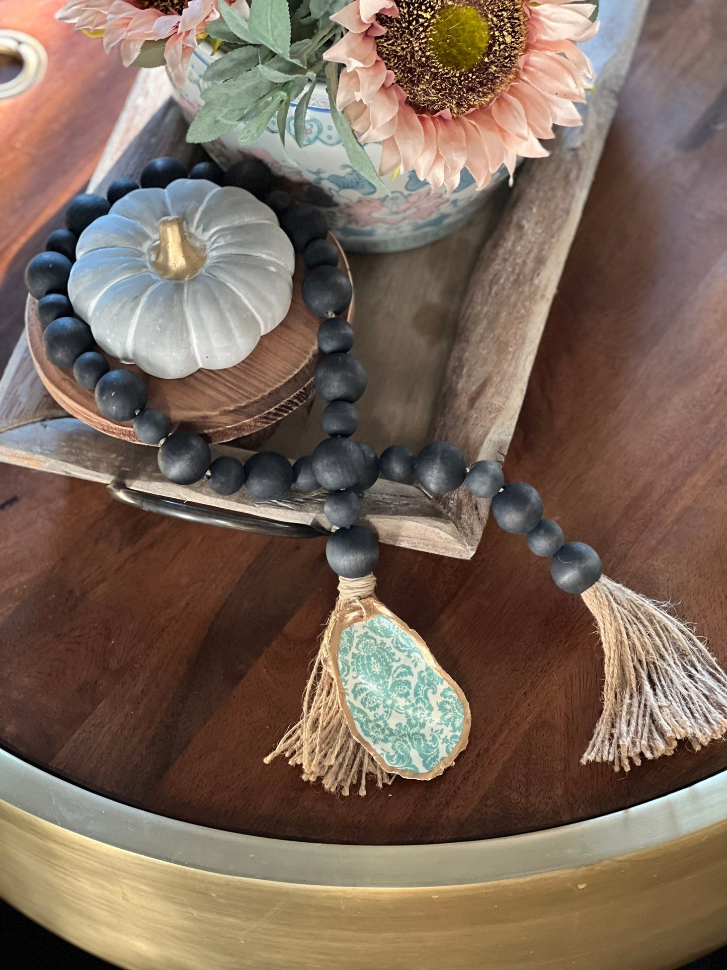 Decoupaged Oyster prayer beads with twine tassels
