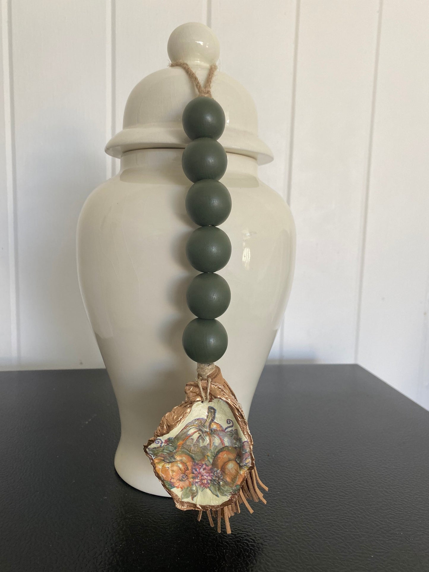 Decoupaged Oyster prayer beads with leather tassel