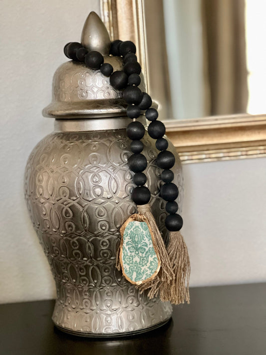 Decoupaged Oyster prayer beads with twine tassels