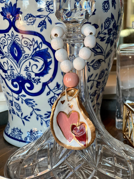 Hand-painted heart oyster shell bottle charm