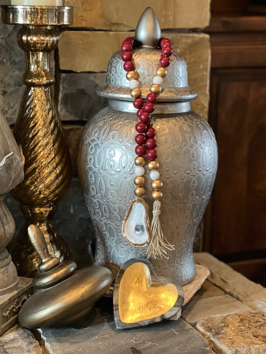 Oyster prayer beads with twine tassel